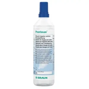Foto frontal em fundo branco da embalagem cilíndrica transparente do Prontosan Solução de 350ml da B. Braun. O frasco contém o líquido límpido e exibe um rótulo branco e azul-claro com o nome "Prontosan" em verde no topo, seguido da descrição "Solução para lavagem de feridas" impressa em vários idiomas. Na base do rótulo, destaca-se o logotipo verde da marca B. Braun e um campo em branco reservado para anotar a data de abertura do produto. O topo possui um bico aplicador cônico protegido por uma tampa plástica azul-escura.